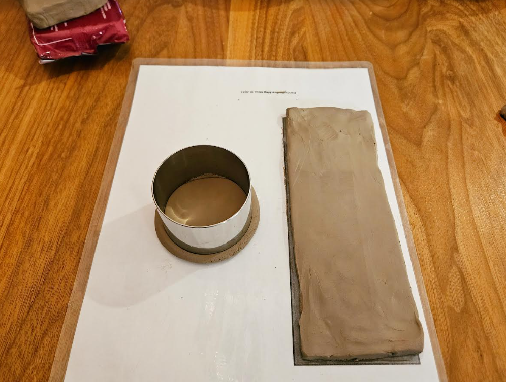 clay craft for kids shows a rectangle of the clay and a circle on the template.