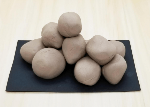 clay crafts for kids shows a pile of balls of clay.