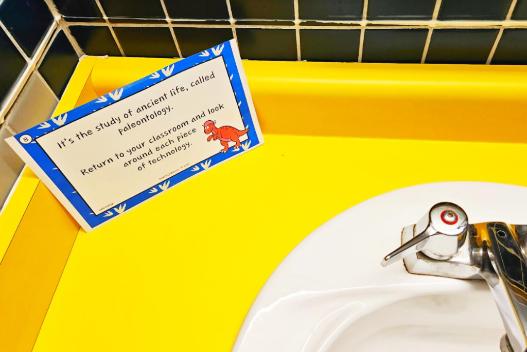 game for preschool shows a riddle page set on a sink in a washroom.
