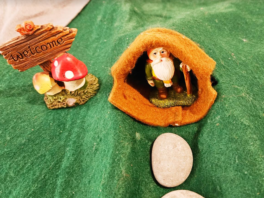 centers for young kids shows a small figure inside a felt burrow.
