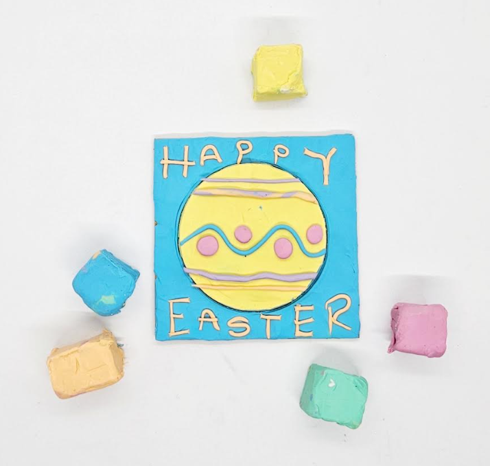 spring craft for kids shows a plasticine art project that says Happy Easter.