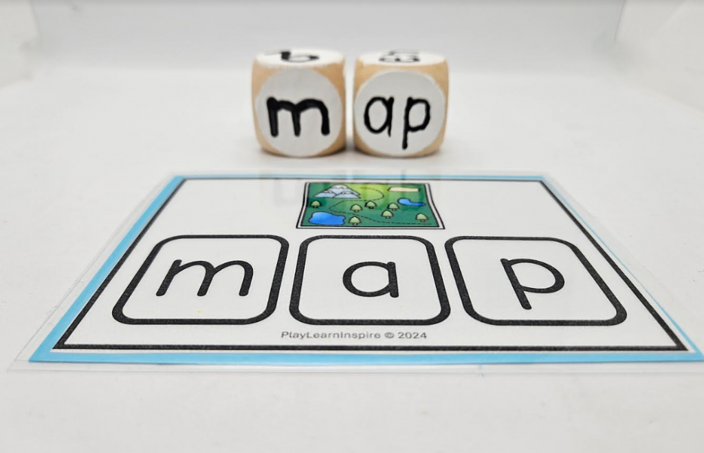 word family game shows a card with the word map and wooden blocks with the word map on them.