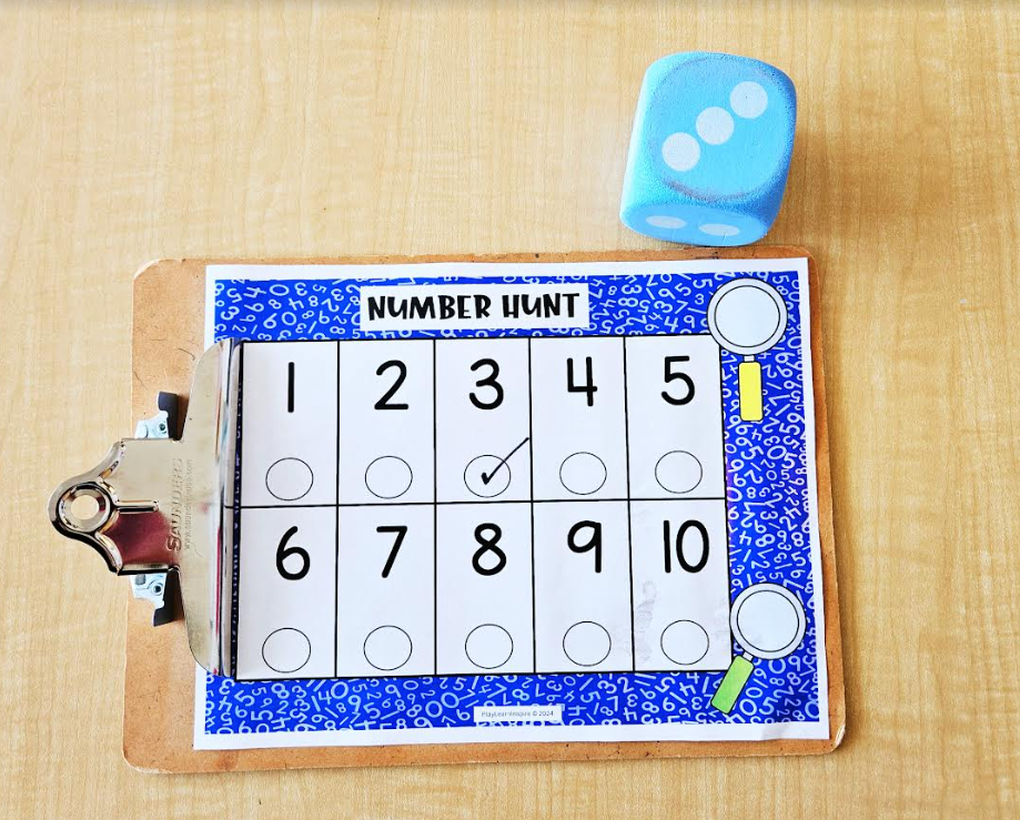 math number hunt shows a worksheet and a die on number 3.