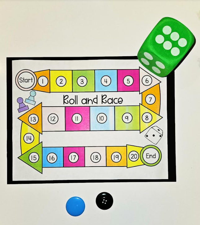 free printable math game shows a printable game sheet, green die and buttons.