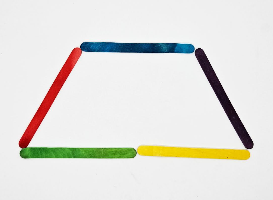 math game for kids shows a trapezoid made from popsicle sticks.