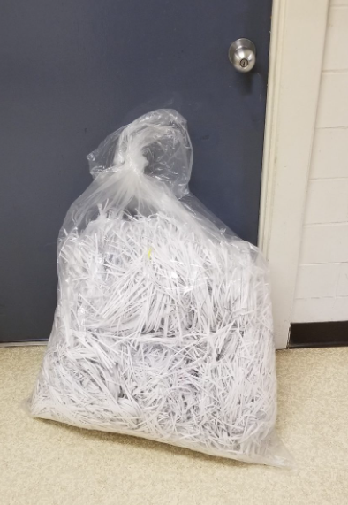 diy Fathers Day gift idea shows a bag of shredded paper.