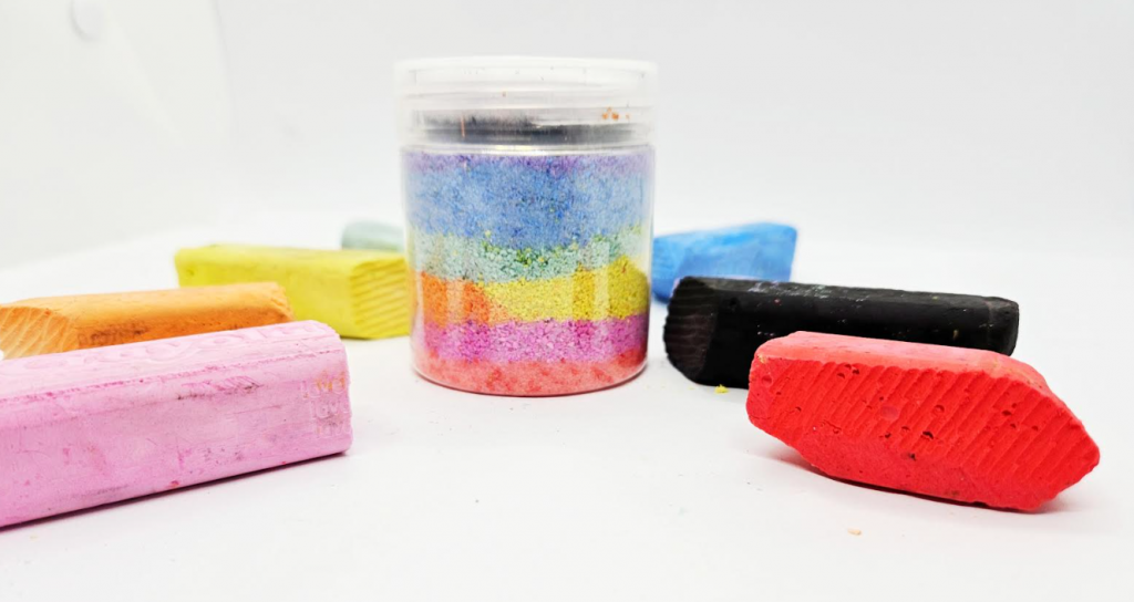 kindergarten craft for kids shows chalk pieces and a jar with layers of chalk.
