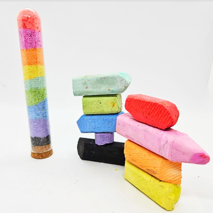 summer art for kids shows chalk stacked and a tube with layers of colored chalk dust.