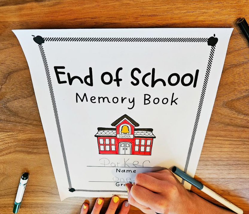 free end of school memory book shows a child coloring the cover of the book.