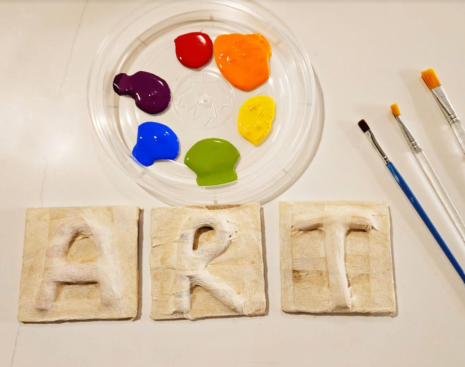 crafts for kids shows the letters ART and a color wheel of paint.