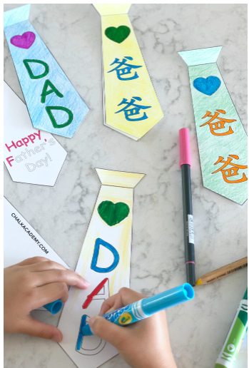 arts and crafts for Father's Day shows a child coloring a printable tie that says DAD.