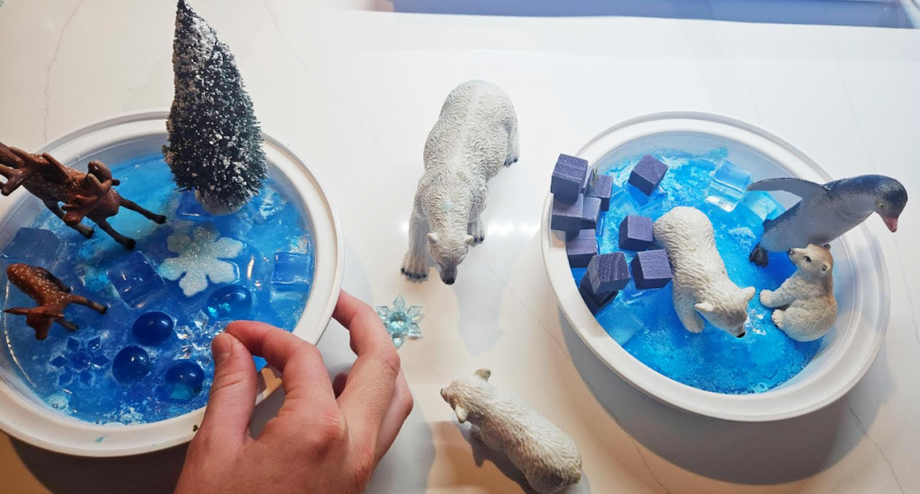 sensory activity for kids shows two trays with plastic animal figures and a child playing in one.